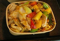 Pad Med Mamuang (Cashew Nut Stir‑Fry)  Wok‑fried chicken or beef with roasted cashew nuts, onions, peppers, carrots, and a mild savoury sauce.