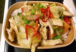 Fragrant Thai green curry with tender chicken, fresh peppers, peas, and chilli, served over steamed rice.